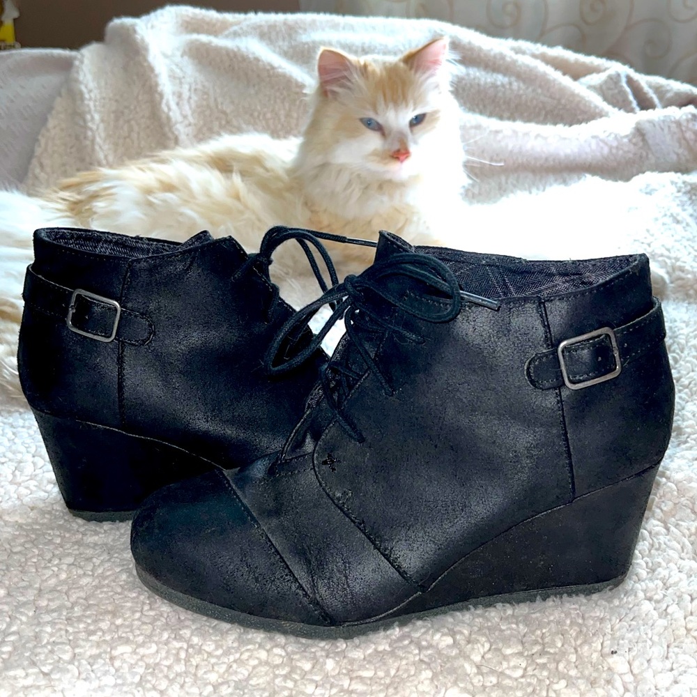Maurices black lace up wedge booties.